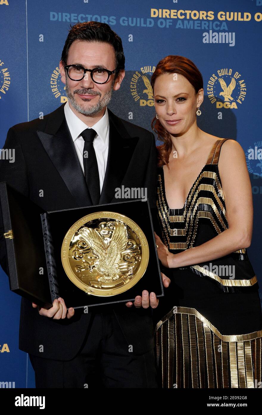 Director Michel Hazanavicius with Berenice Bejo, winner of the Outstanding Directorial Achievement in Feature Film for 2011 award for 'The Artist,' pose in the Press Room of the 64th Annual Directors Guild of America Awards in Los Angeles, January 28, 2012. Photo by Lionel Hahn/ABACAPRESS.COM Stock Photo