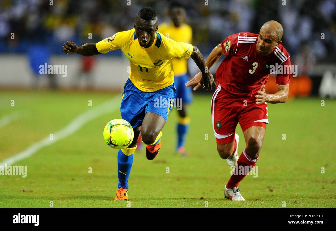 Gabon's Eric Mouloungui and Morocco's Badr El Kaddouri during the 2012 Africa Cup of Nations soccer match, Gabon Vs Morocco at the stade de l'amitie in Libreville, Gabon on January 27, 2012. Gabon won 3-2. Photo by ABACAPRESS.COM Stock Photo