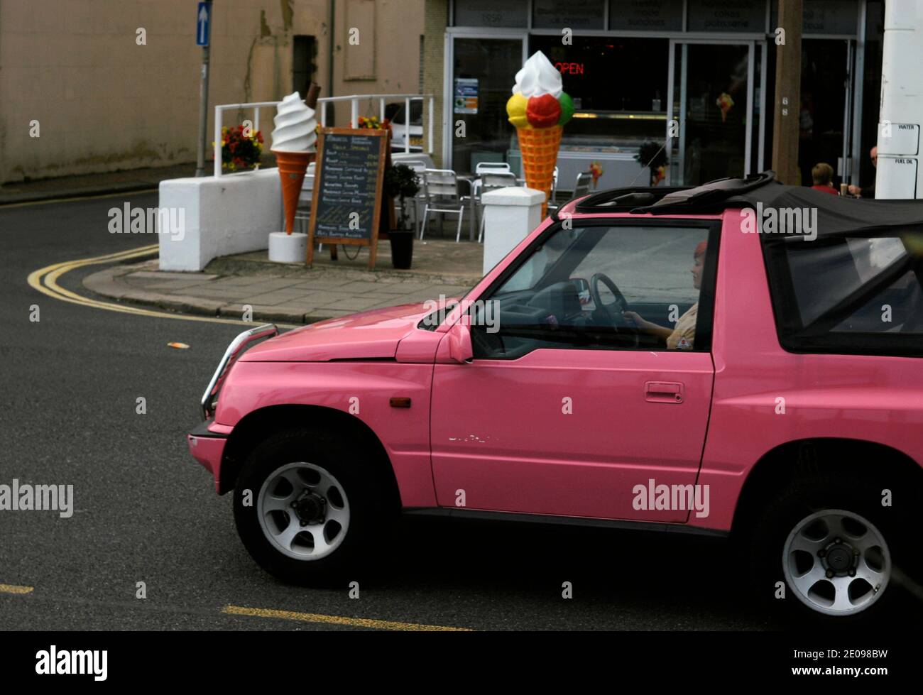 AJAXNETPHOTO. 2011. WORTHING, ENGLAND. - PINK SOFT TOP - SUZUKI VITARA CONVERTIBLE SOFT TOP ON THE ROAD.PHOTO:JONATHAN EASTLAND/AJAX REF:RD110308 2077 Stock Photo