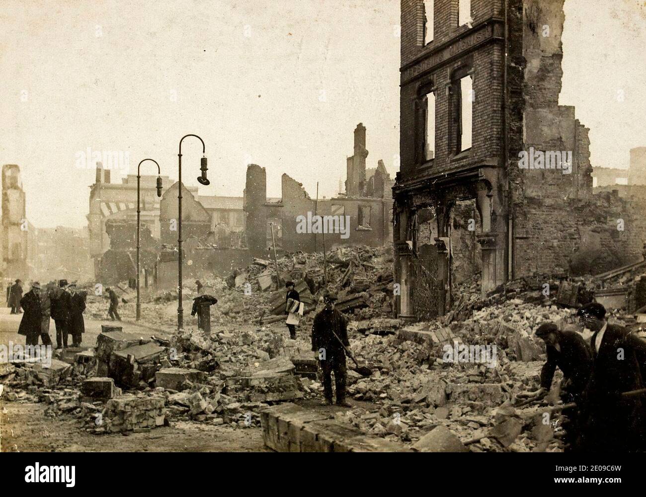 St Patrick's Street in Cork, Ireland on (or around) 14 December 1920. The image captures the aftermath of what's known as the Burning of Cork. This event occurred on 11-12 December 1920 during the Irish War of Independence. Stock Photo