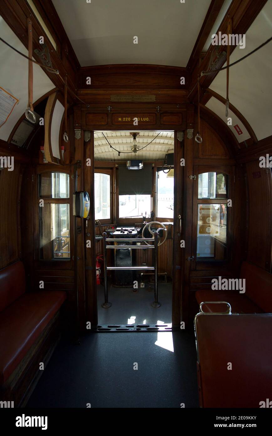 Inside a heritage tram in Porto, Portugal. Wooden interior inside a vintage tram. Stock Photo