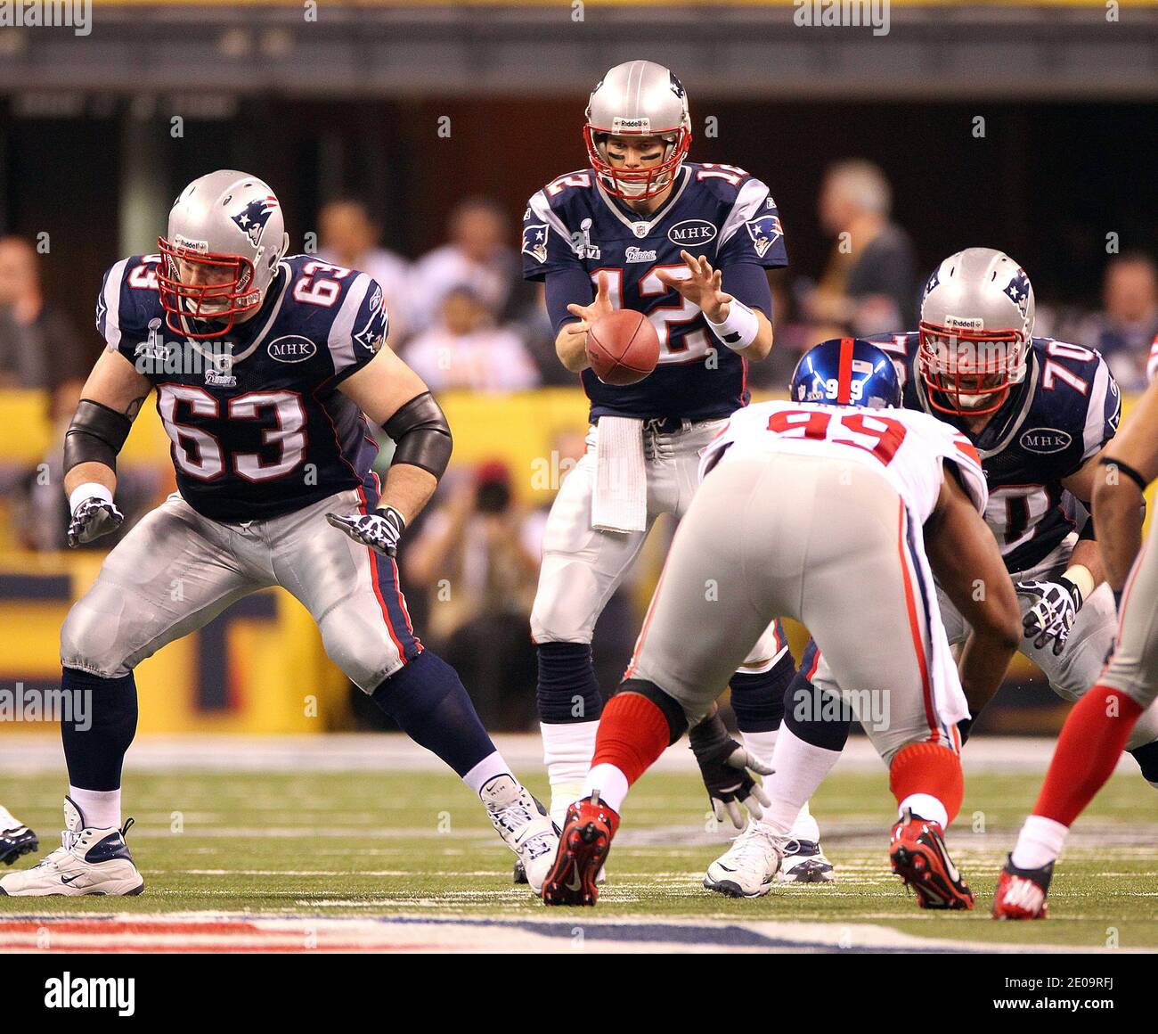 Tom Brady (12) of the New England Patriots throws a pass during the AFC  Championship game at Sports Authority Field at Mile High in Denver on  January 19, 2014. The New England-Denver