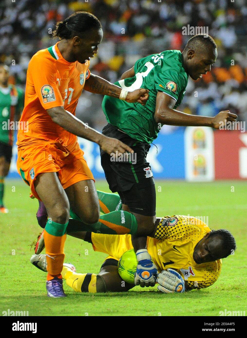 Ivory Coast's Didier Drogba and Zambia's Stophira Sunzu and Boubacar Barry during the 2012 African Cup of Nations Soccer Match, Final, Zambia Vs Ivory Coast in Libreville, Gabon on February 12, 2012. Photo by ABACAPRESS.COM Stock Photo