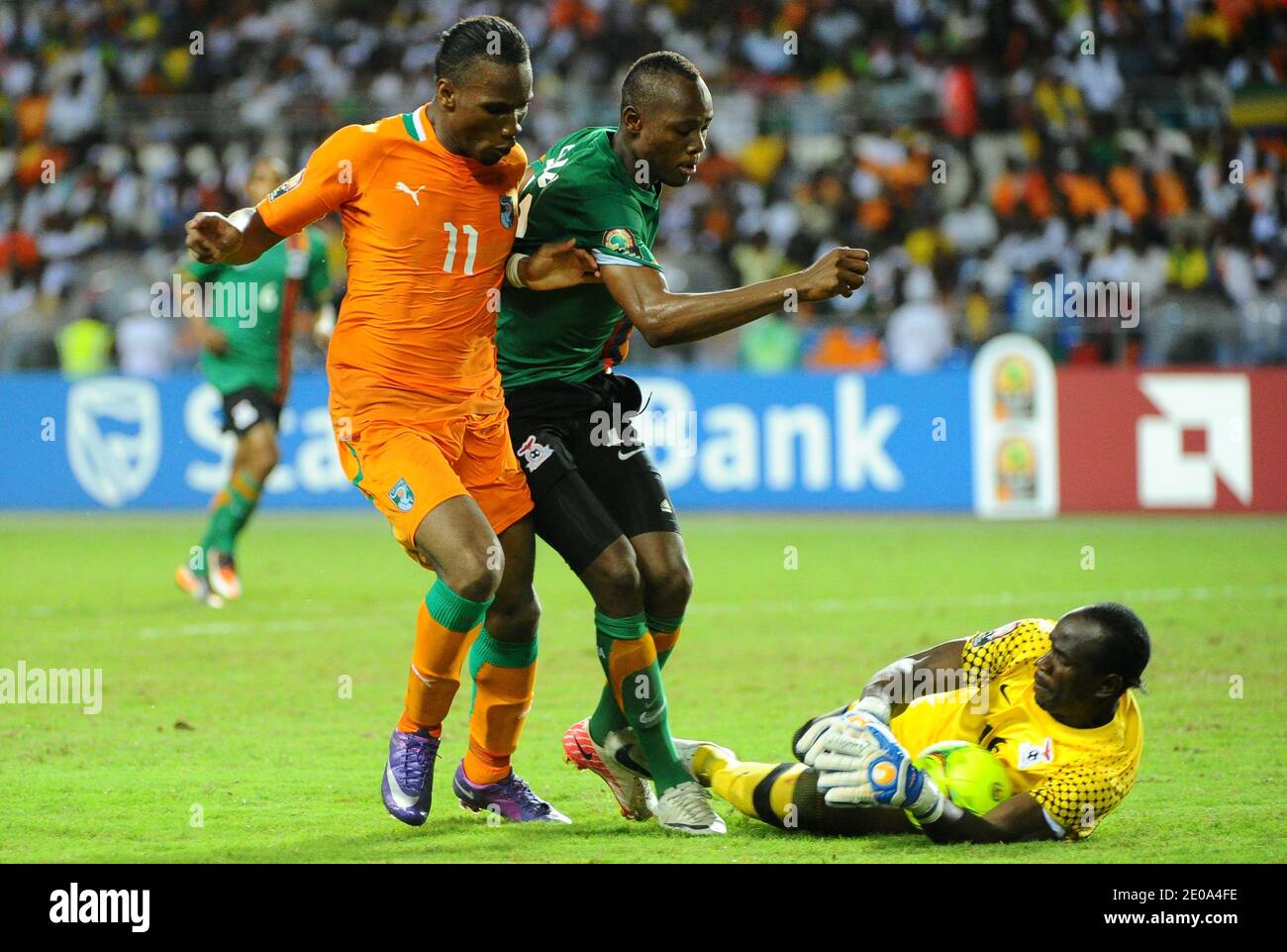 Ivory Coast's Didier Drogba and Zambia's Stophira Sunzu and Boubacar Barry during the 2012 African Cup of Nations Soccer Match, Final, Zambia Vs Ivory Coast in Libreville, Gabon on February 12, 2012. Photo by ABACAPRESS.COM Stock Photo