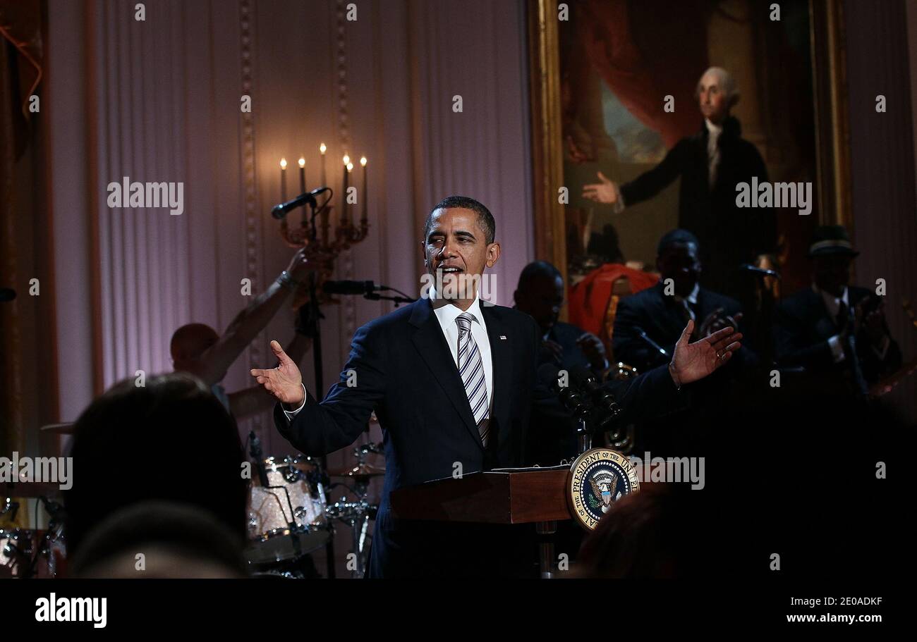 U.S. President Barack Obama speaks at a White House event titled In Performance at the White House: Red, White and Blues in Washington, DC on February 21, 2012. As part of the In Perfomance series, music legends and contemporary major artists have been invited to perform at the White House for a celebration of Blues music and in recognition of Black History Month. The program featured performances by Troy 'Trombone Shorty' Andrews, Gary Clark, Jr., Shemekia Copeland, Buddy Guy, Warren Haynes, Mick Jagger, Keb Mo, Susan Tedeschi and Derek Trucks, with Taraji P. Henson as the program host and Bo Stock Photo