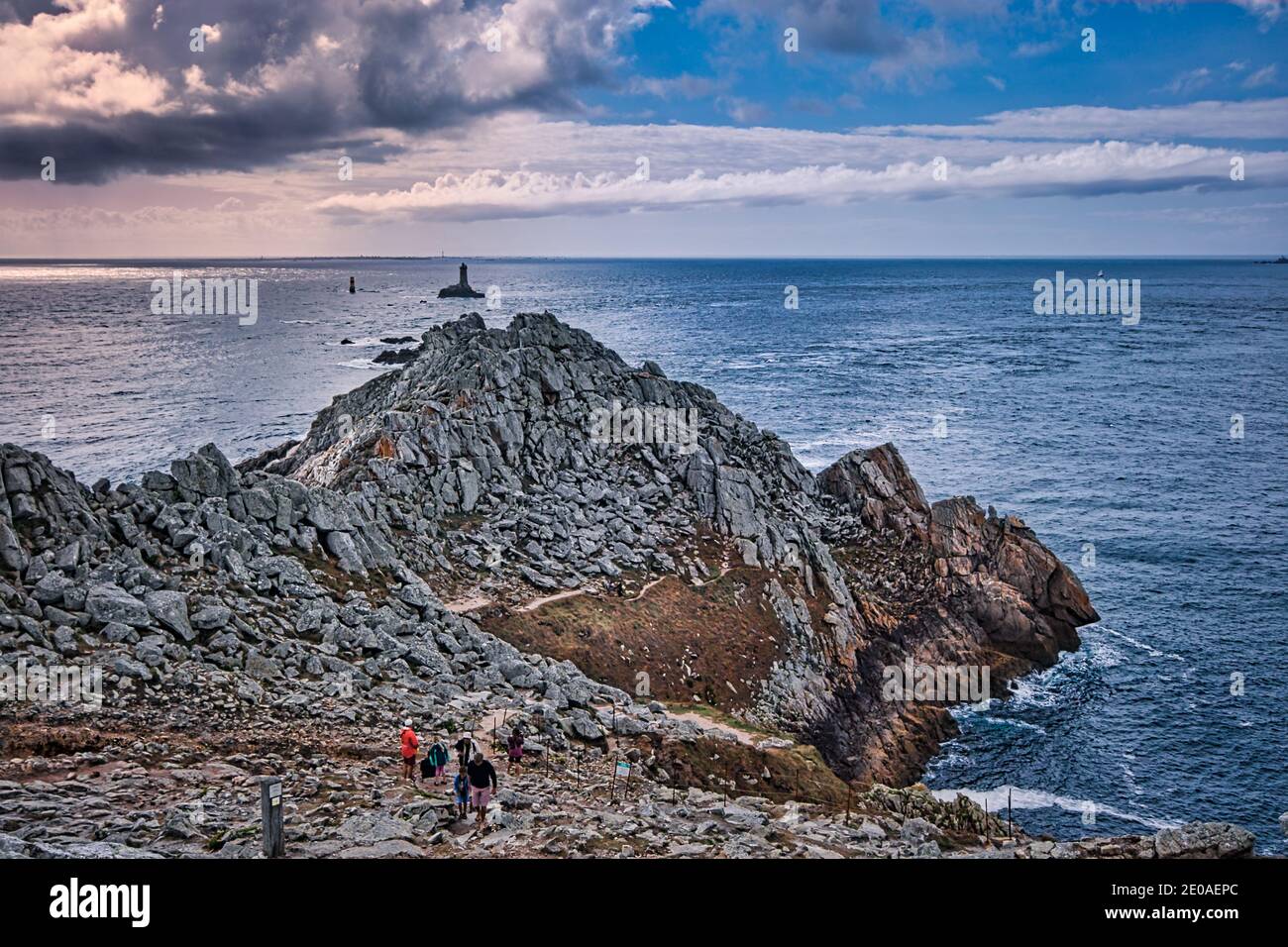 Pointe du Raz is the westernmost tip of France. It is a promontory overlooking the Iroise Sea on the Atlantic coast of Brittany. Stock Photo