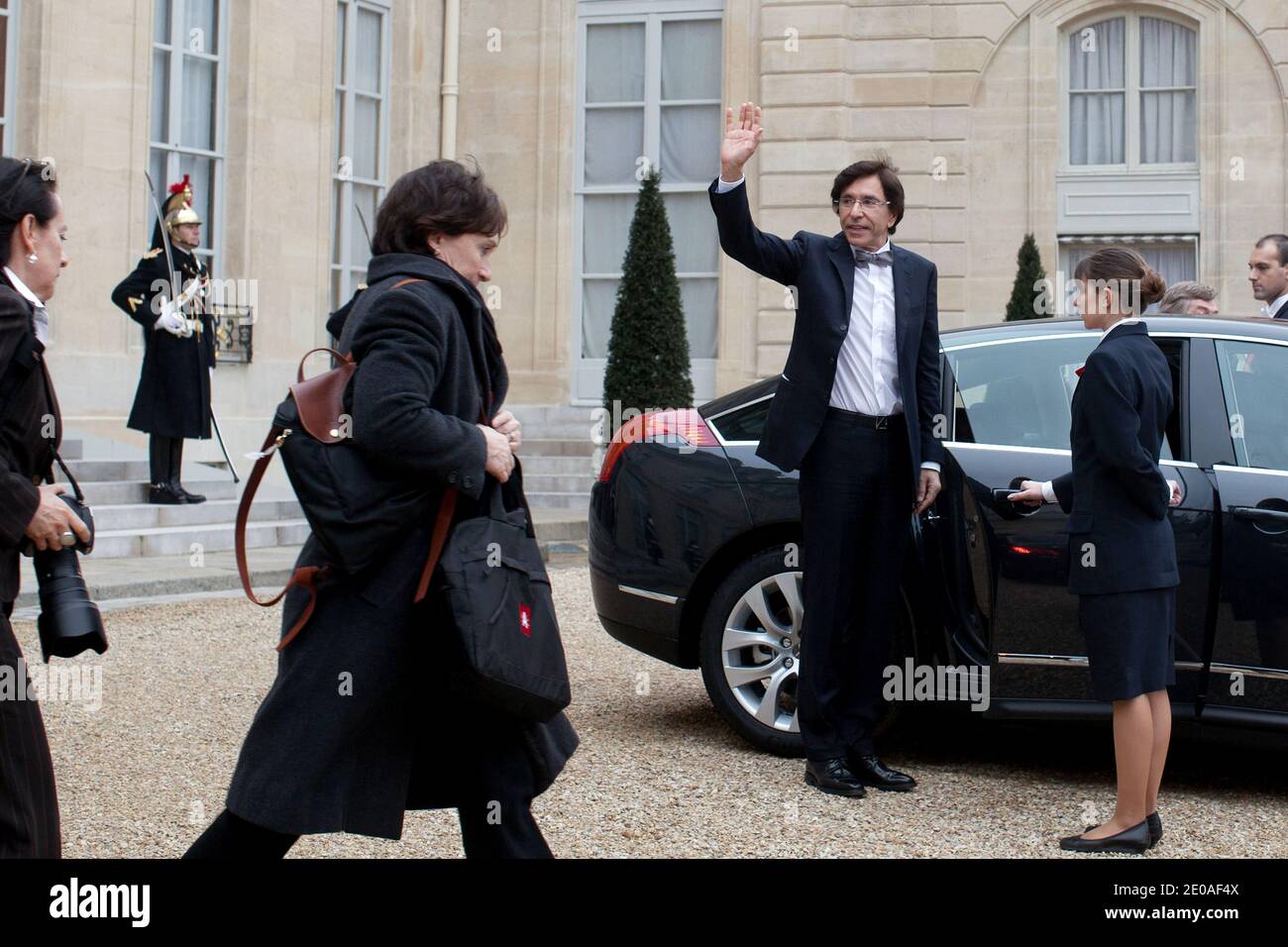 Belgium Prime Minister Elio Di Rupo salutes as he leaves the Elysee Palace after a meeting with French President Nicolas Sarkozy, in Paris, France on February 24, 2012. Photo by Stephane Lemouton/ABACAPRESS.COM. Stock Photo