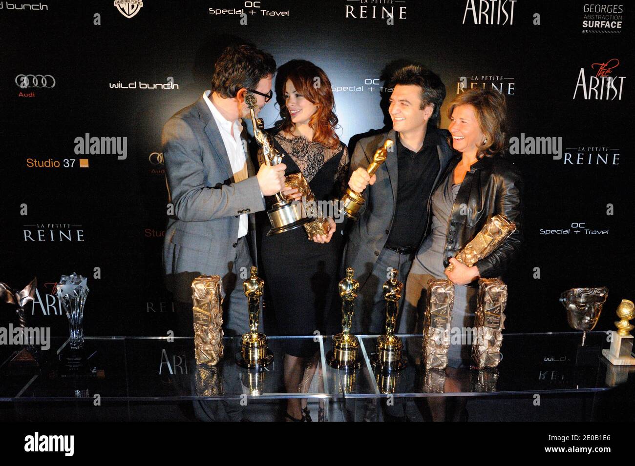 Michel Hazanavicius, Berenice Bejo, Thomas Langmann attending 'The Artist' party held at 'Le George' restaurant in Paris, France, on March 6, 2012. Photo by Alban Wyters/ABACAPRESS.COM Stock Photo