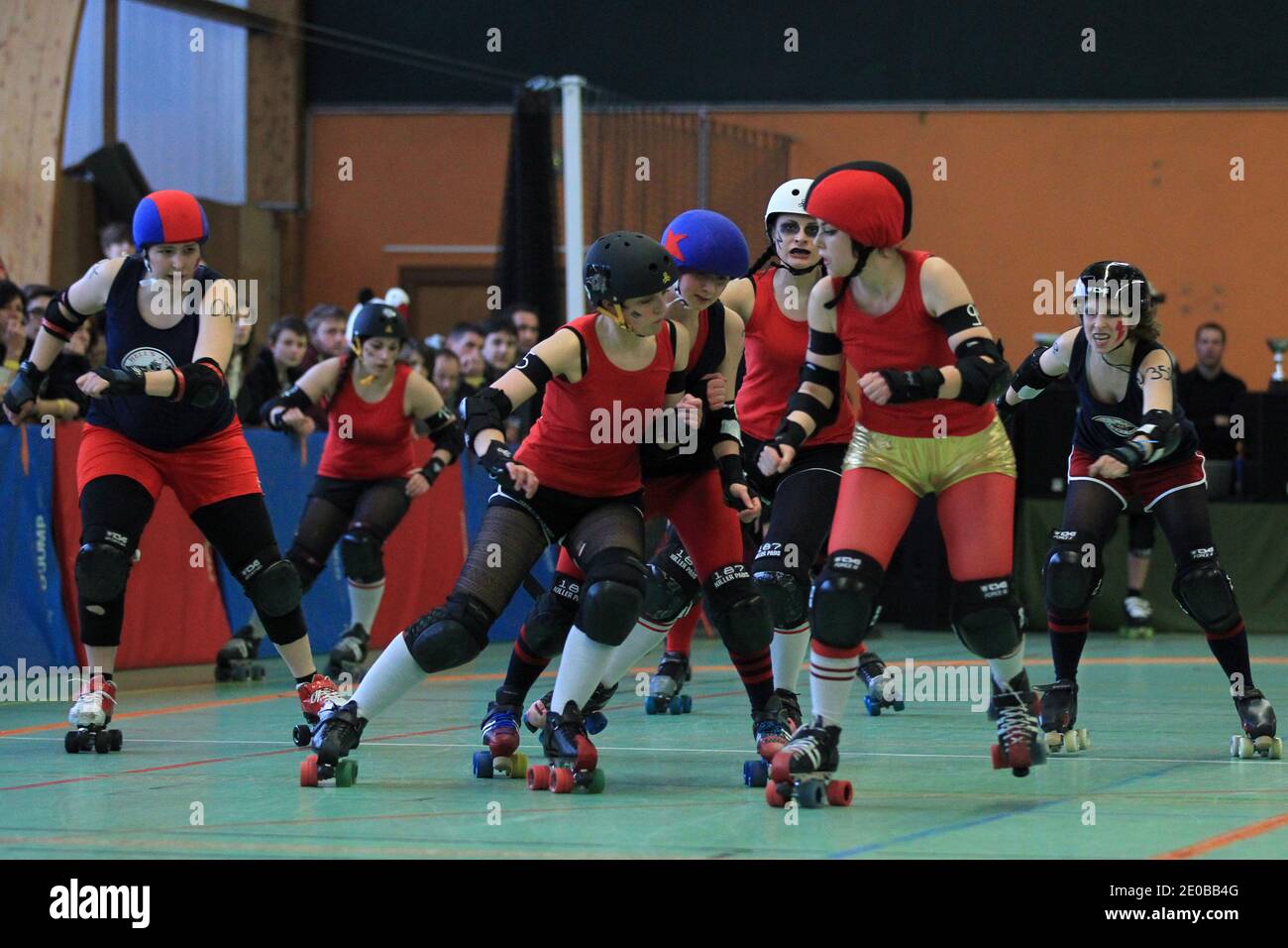 Metz Roller Girls (red) playing a match against Strasbourg Roller Derby  Girls (blue) during a national tournament in Nantes, western France on  March 17, 2012. Roller Derby is an American-invented contact sport.