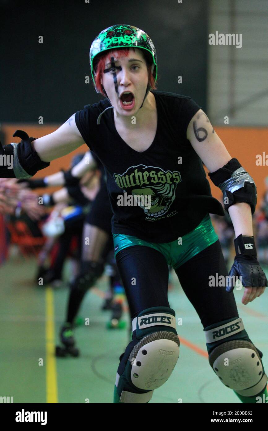 Paris Roller Girls (red) playing a match against Duchesses Nantes Roller  Derby Girls (green) during a national tournament in Nantes, western France  on March 17, 2012. Roller Derby is an American-invented contact