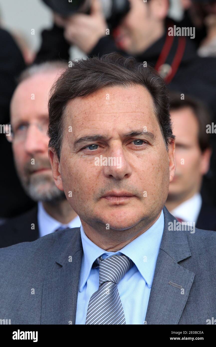 Eric Besson, French Minister of Industry, poses during the opening of ...