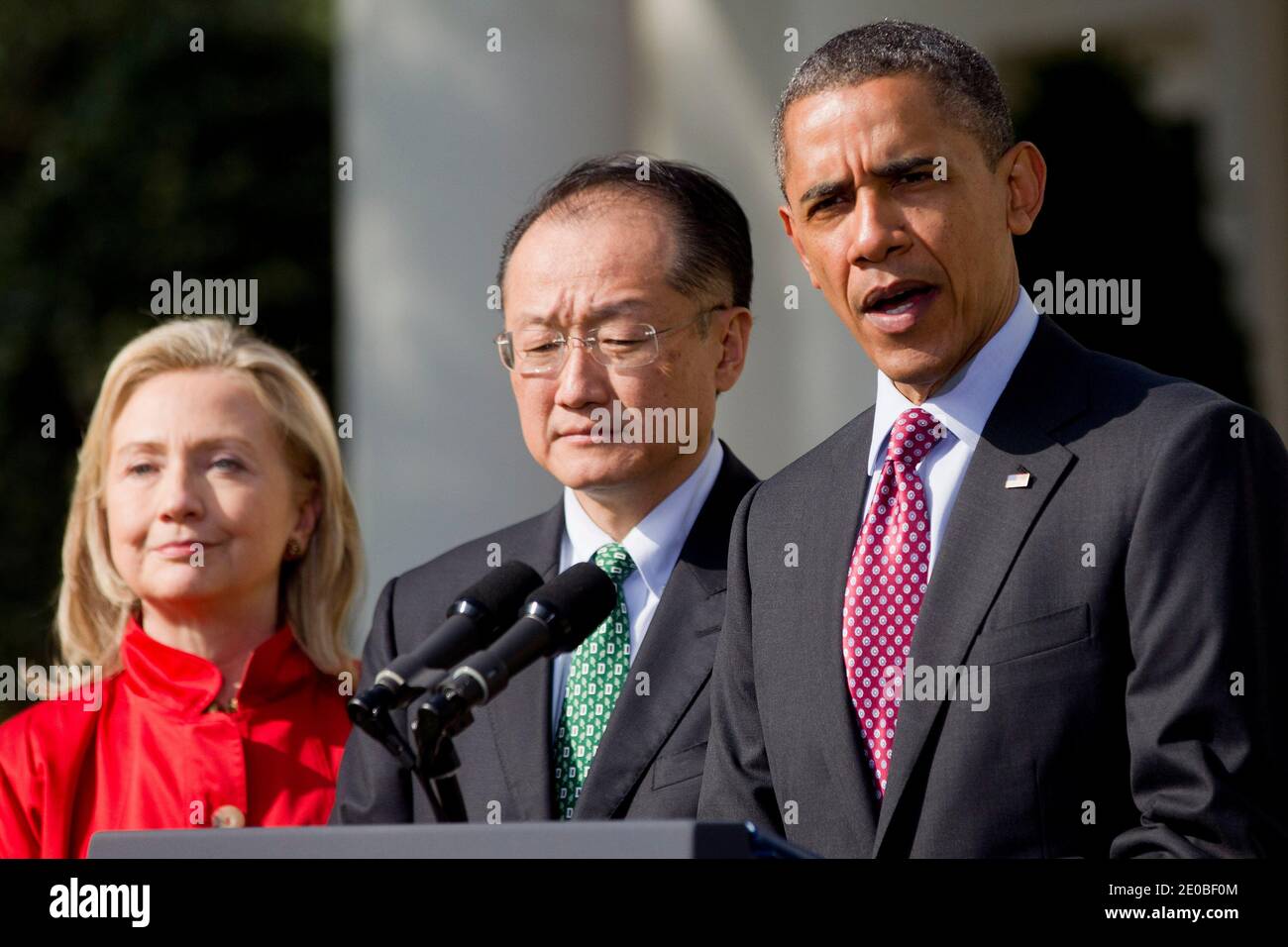 U.S. President Barack Obama, right, introduces Jim Yong Kim, president of Dartmouth College, as a nominee to become president of the World Bank with Hillary Clinton, U.S. secretary of state, in the Rose Garden of the White House in Washington on March 23, 2012. Kim was born in Seoul and is a U.S. citizen. He would succeed Robert Zoellick as the head of the bank. The bank made $57 billion loans in the last fiscal year. Photo by Andrew Harrer/Pool/ABACAPRESS.COM Stock Photo