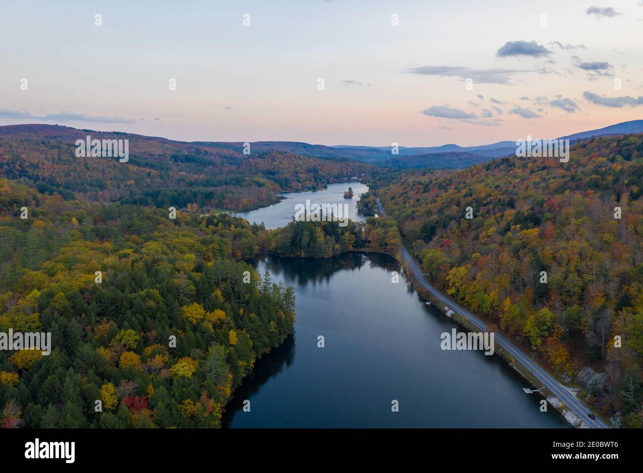 Aerial view of Amherst Lake in fall foliage in Plymouth, Vermont Stock