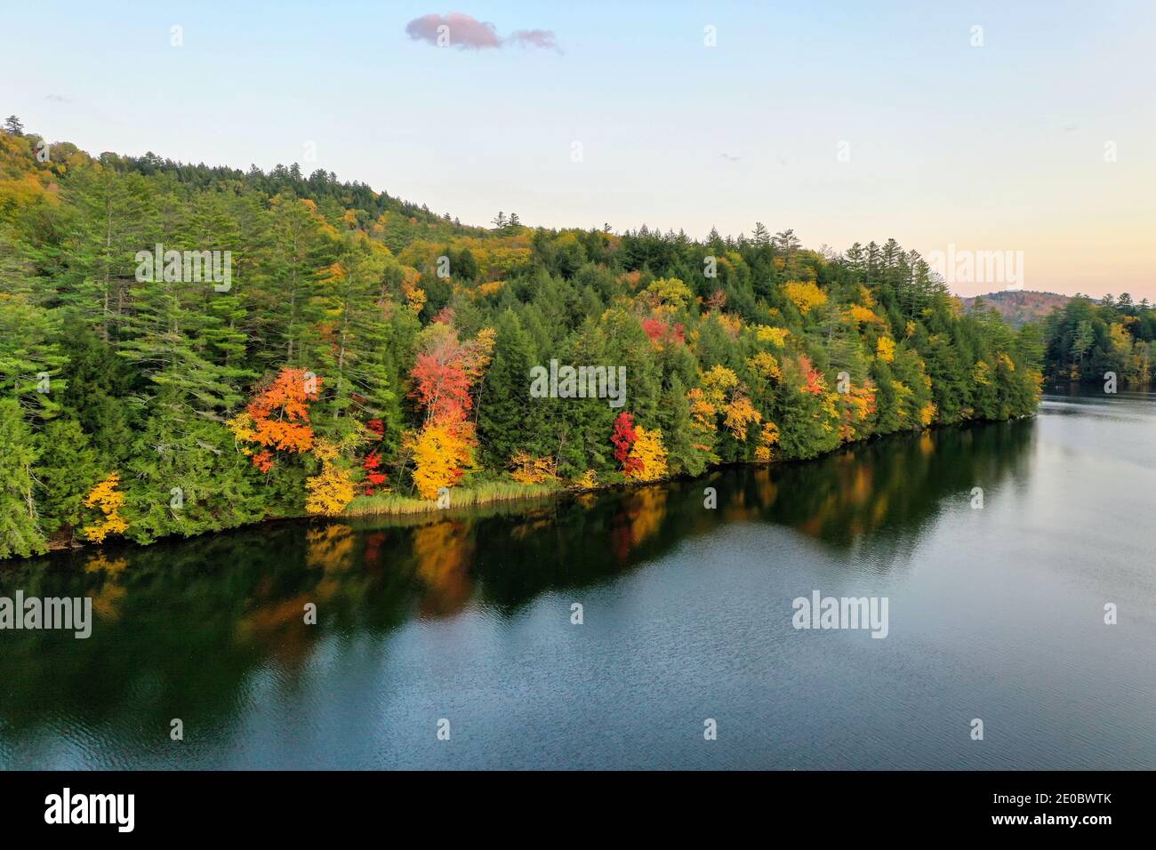 Aerial view of Amherst Lake in fall foliage in Plymouth, Vermont Stock