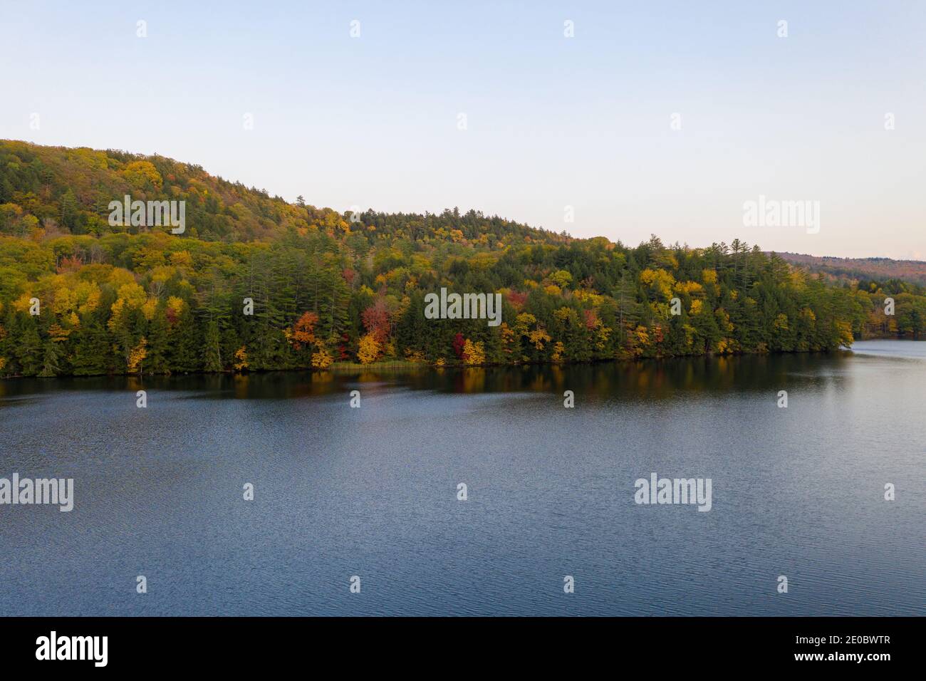Aerial view of Amherst Lake in fall foliage in Plymouth, Vermont Stock