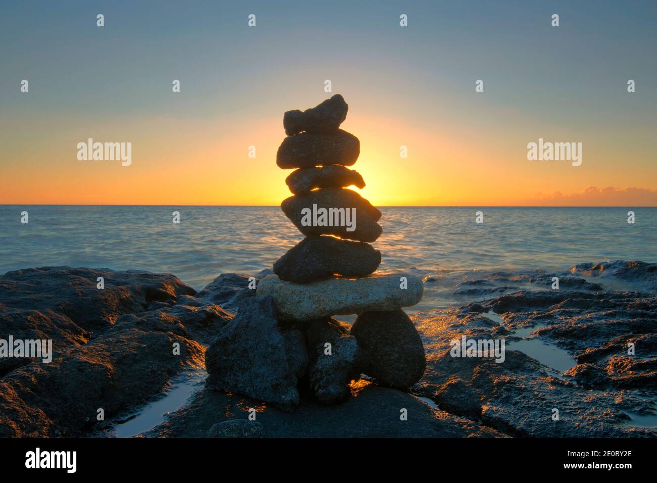 Rock stack on the beach at sunset. Big Island,  Hawaii Stock Photo