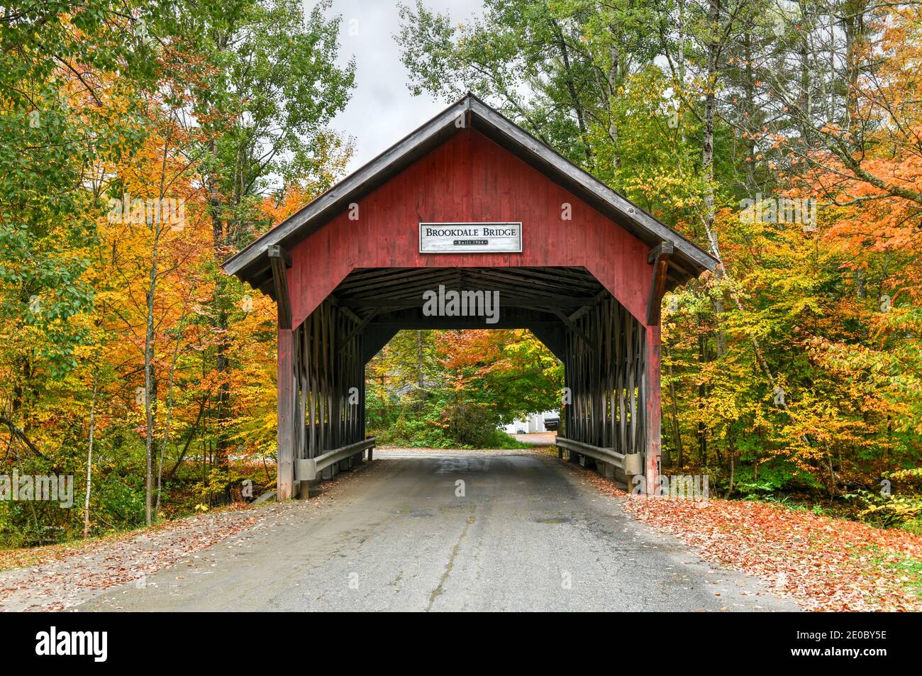 Brookdale Covered Bridge in Stowe, Vermont during fall foliage over the ...