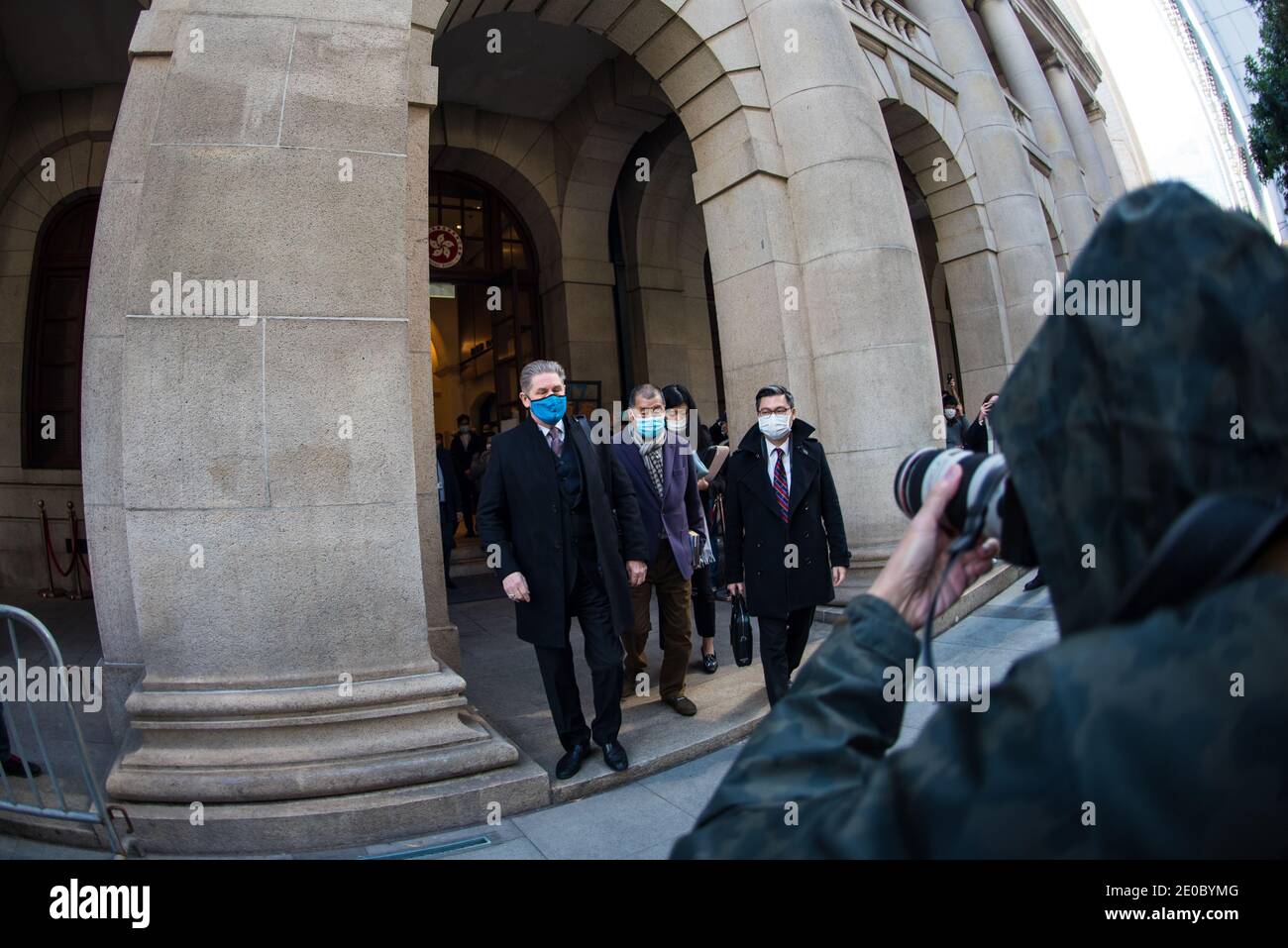 Hong Kong, China. 31st Dec, 2020. Media Tycoon JImmy Lai exits the Court of Final Appeal accompanied by his lawyers after an urgent hearing requested by the Department of Justice on his bail for National Security Law alleged breaches. Credit: Marc R. Fernandes/Alamy Live News. Stock Photo
