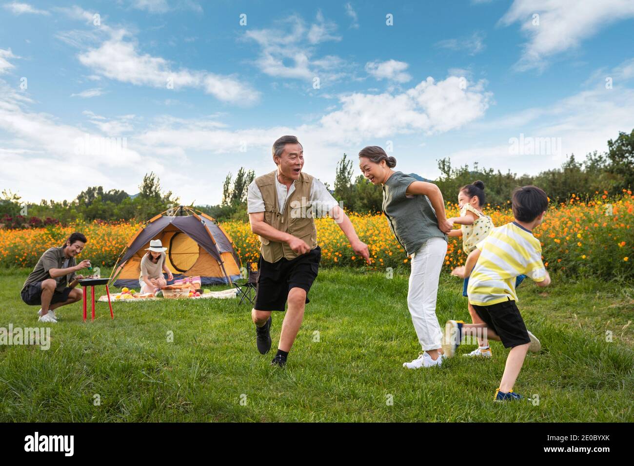 Happy family in the outdoor outing Stock Photo Alamy