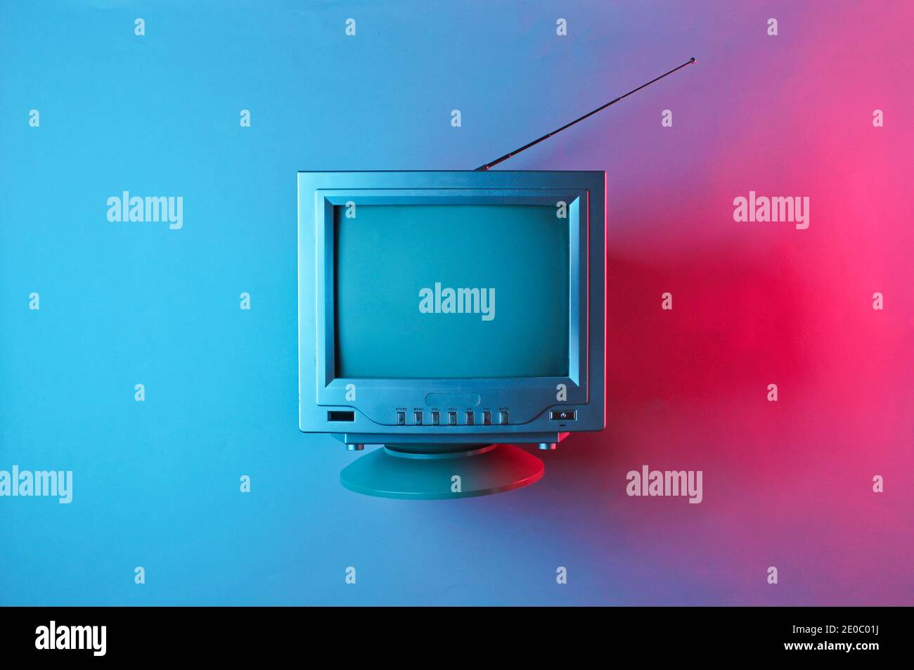 Retro wave, 80s. Old tv with antenna with neon light. Top view