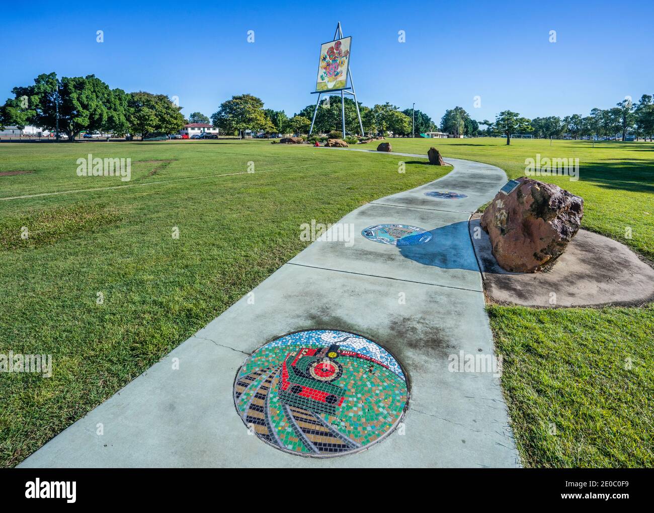 Emerald Centenary of Federation Mosaic Pathway and the Giant Van Gogh Sunflower on the Big Easel in Morton Park, Emerald, Central Highlands Region, Qu Stock Photo