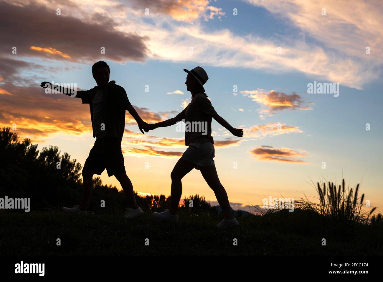 The happy couple in the sunset Stock Photo