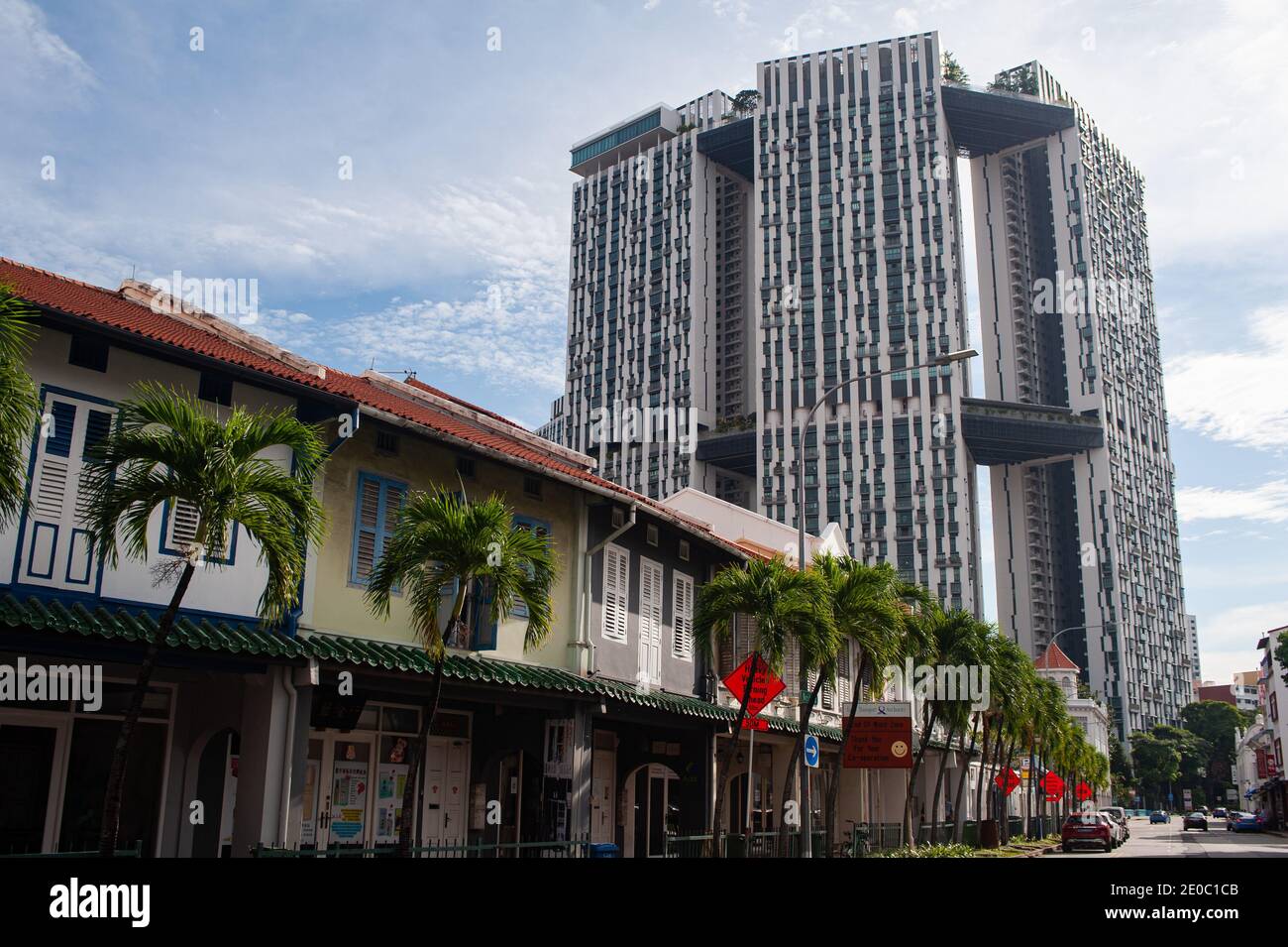 02.12.2020, Singapore, Republic of Singapore, Asia - Shophouses between Chinatown and Tanjong Pagar with Pinnacle at Duxton housing complex. Stock Photo
