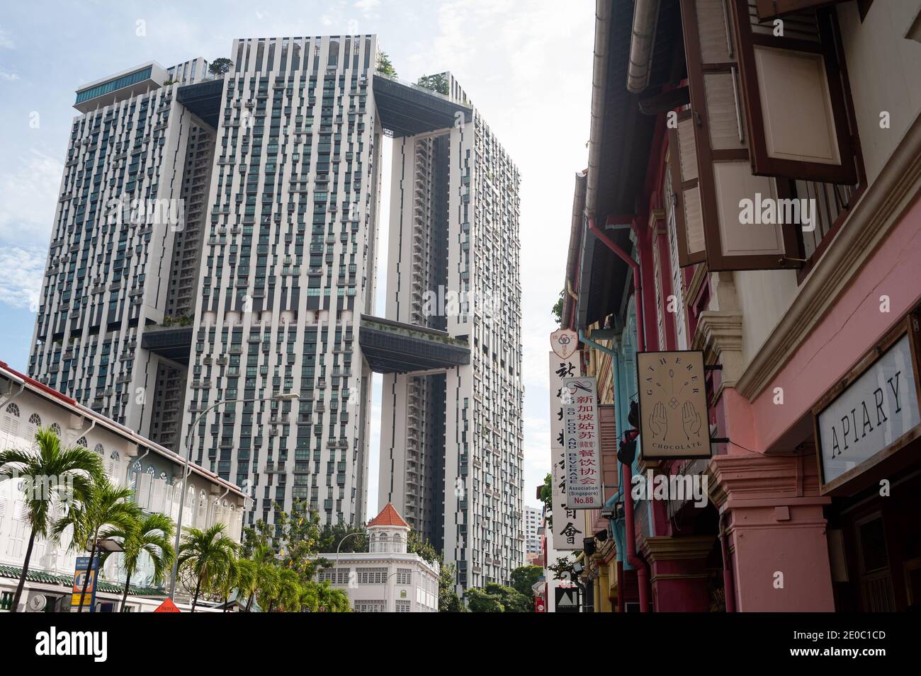02.12.2020, Singapore, Republic of Singapore, Asia - Shophouses between Chinatown and Tanjong Pagar with Pinnacle at Duxton housing complex. Stock Photo