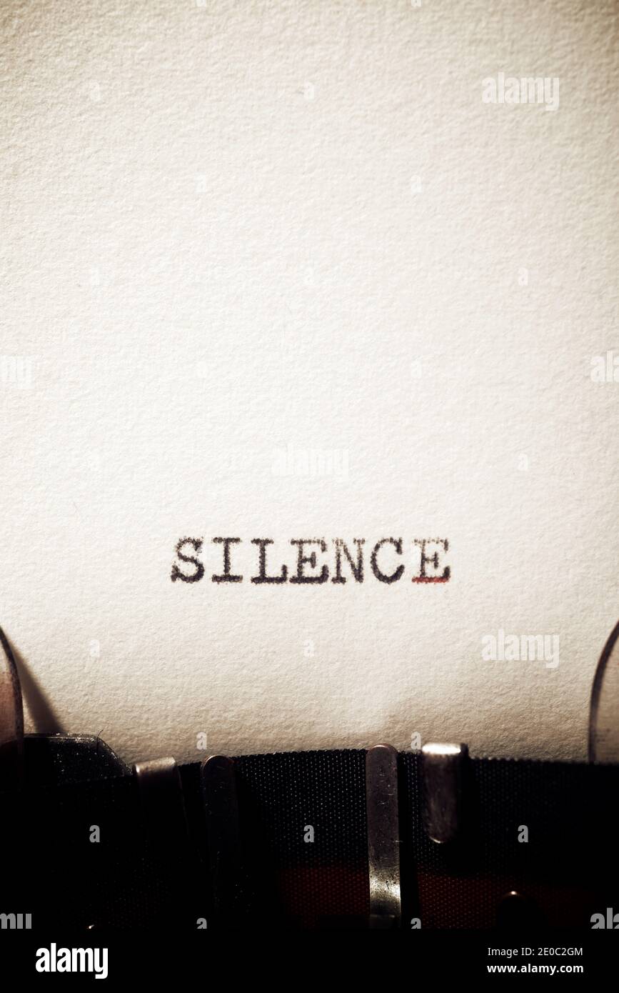 Silence word written with a typewriter. Stock Photo