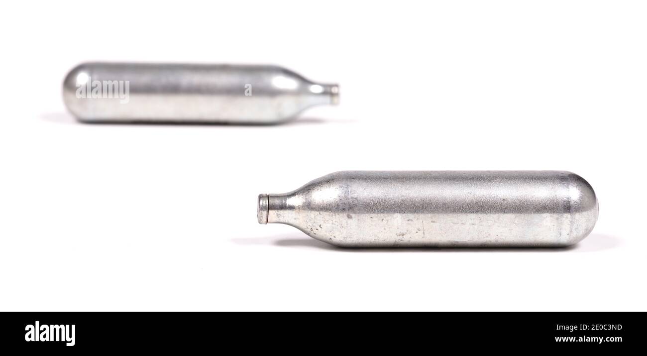 Empty canister of laughing gas, isolated on white Stock Photo Alamy