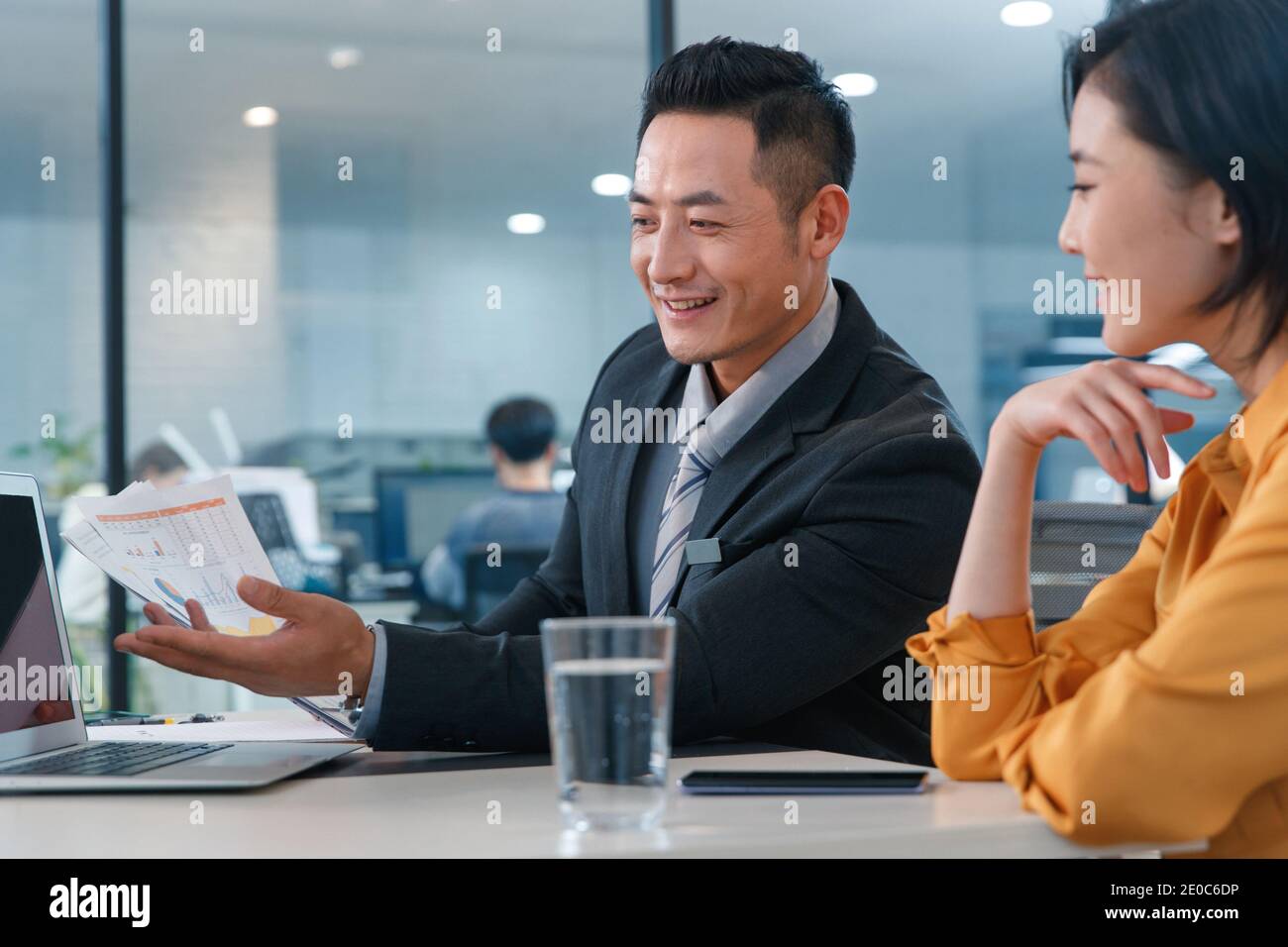 Sales staff with clients Stock Photo