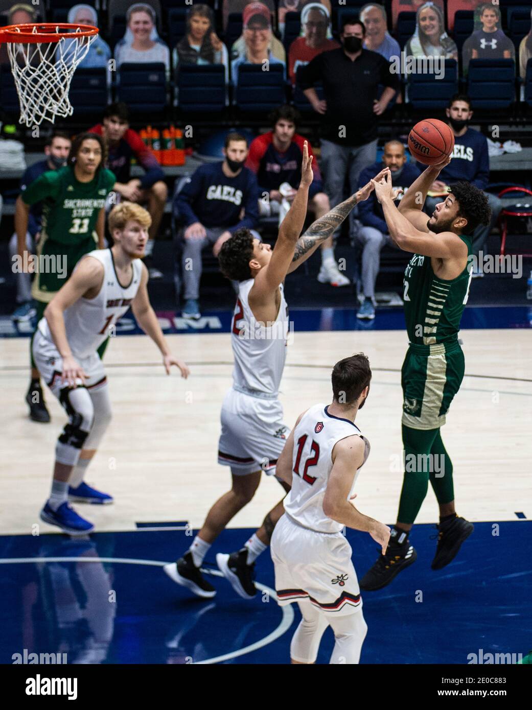 Moraga, CA U.S. 30th Dec, 2020. A. Sacramento State Hornets forward Ethan Esposito (22) takes a shot at the top of the key during the NCAA Men's Basketball game between Sacramento State Hornets and the Saint Mary's Gaels 45-63 lost at McKeon Pavilion Moraga Calif. Thurman James/CSM/Alamy Live News Stock Photo