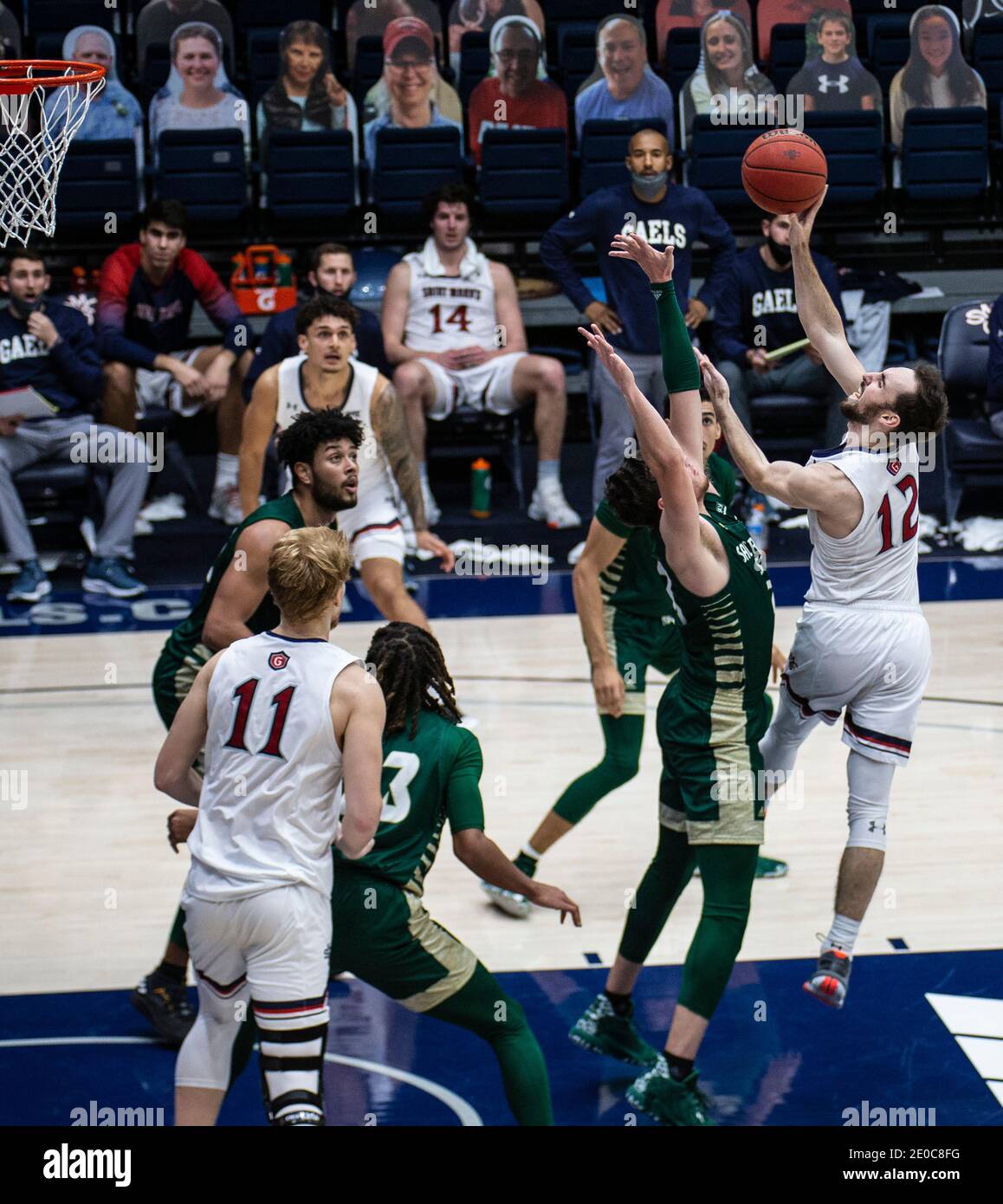 Moraga, CA U.S. 30th Dec, 2020. A. St. Mary's Gaels guard Tommy Kuhse (12) drives to the basket during the NCAA Men's Basketball game between Sacramento State Hornets and the Saint Mary's Gaels 63-45 win at McKeon Pavilion Moraga Calif. Thurman James/CSM/Alamy Live News Stock Photo