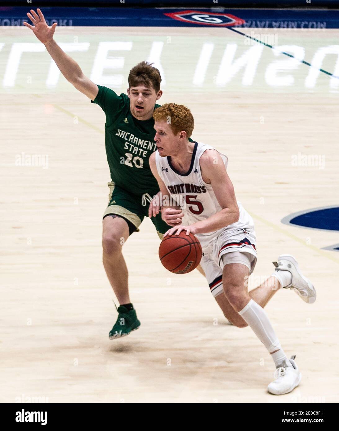 Moraga, CA U.S. 30th Dec, 2020. A. St. Mary's Gaels guard Jabe Mullins (5) drives to the hoop during the NCAA Men's Basketball game between Sacramento State Hornets and the Saint Mary's Gaels 63-45 win at McKeon Pavilion Moraga Calif. Thurman James/CSM/Alamy Live News Stock Photo