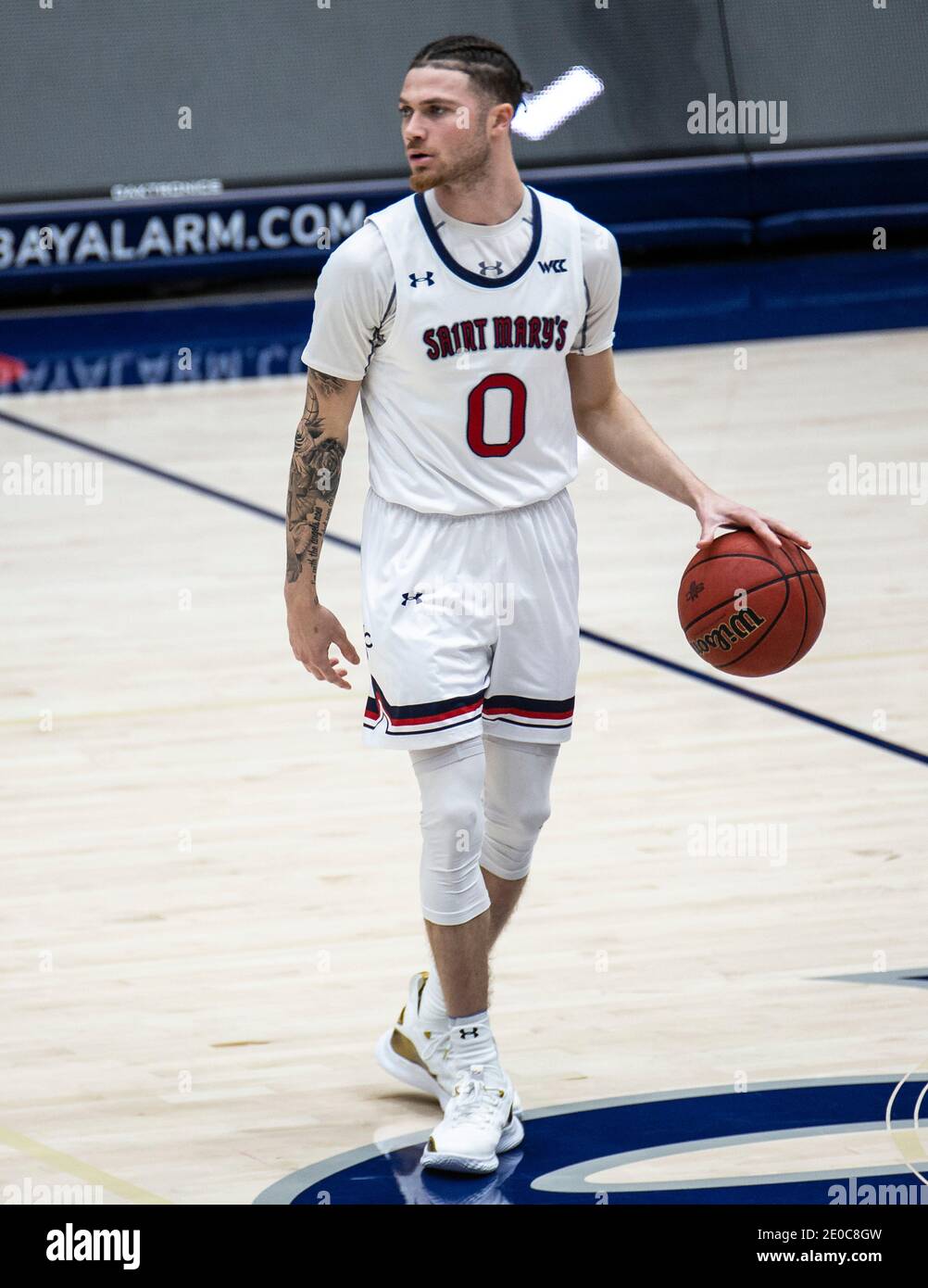 Moraga, CA U.S. 30th Dec, 2020. A. St. Mary's Gaels guard Logan Johnson (0) sets the play during the NCAA Men's Basketball game between Sacramento State Hornets and the Saint Mary's Gaels 63-45 win at McKeon Pavilion Moraga Calif. Thurman James/CSM/Alamy Live News Stock Photo
