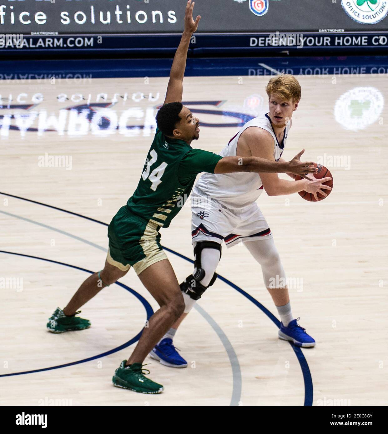 Moraga, CA U.S. 30th Dec, 2020. A. St. Mary's Gaels forward Matthias Tass (11) looks to pass the ball during the NCAA Men's Basketball game between Sacramento State Hornets and the Saint Mary's Gaels 63-45 win at McKeon Pavilion Moraga Calif. Thurman James/CSM/Alamy Live News Stock Photo