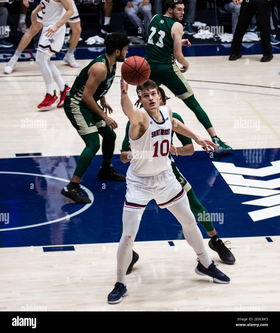 Moraga, CA U.S. 30th Dec, 2020. A. St. Mary's Gaels center Mitchell Saxen (10) grabs the ball during the NCAA Men's Basketball game between Sacramento State Hornets and the Saint Mary's Gaels 63-45 win at McKeon Pavilion Moraga Calif. Thurman James/CSM/Alamy Live News Stock Photo
