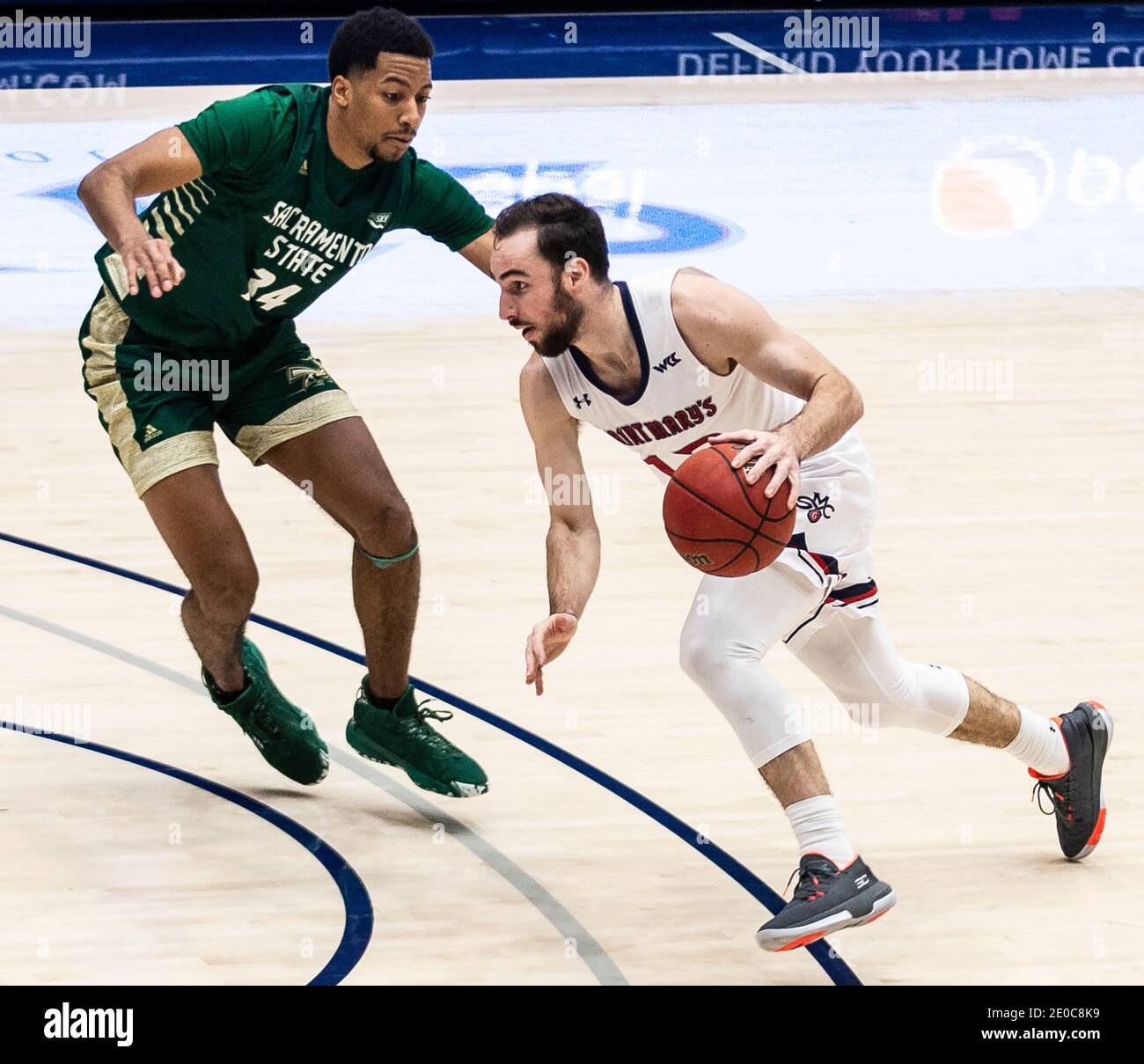 Moraga, CA U.S. 30th Dec, 2020. A. St. Mary's Gaels guard Tommy Kuhse (12) drives to the basket during the NCAA Men's Basketball game between Sacramento State Hornets and the Saint Mary's Gaels 63-45 win at McKeon Pavilion Moraga Calif. Thurman James/CSM/Alamy Live News Stock Photo