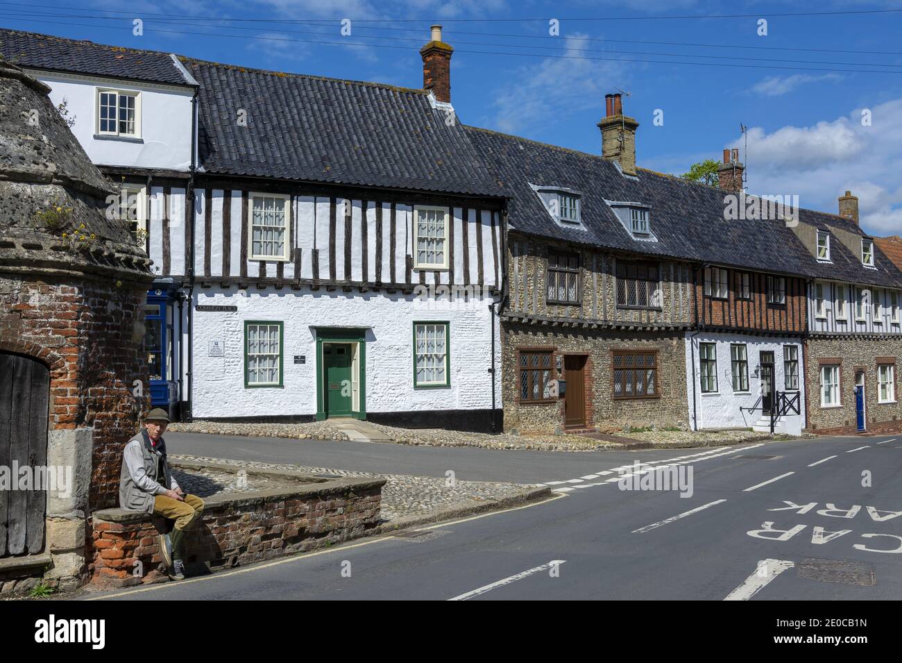 Shops and houses with traditional facades in charming village of Little Walsingham in North