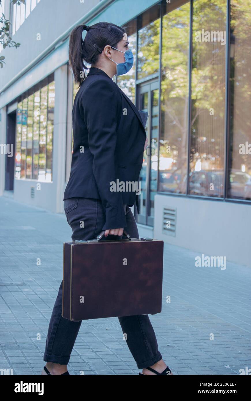 Woman wearing leather mask hi-res stock photography and images - Alamy