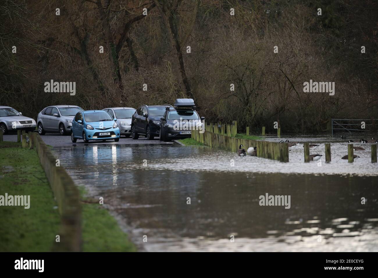 Peterborough, UK. 27th Dec, 2020. Cars find this road impassable as floodwater has swamped it near Peterborough, Cambridgeshire. Credit: Paul Marriott/Alamy Live News Stock Photo