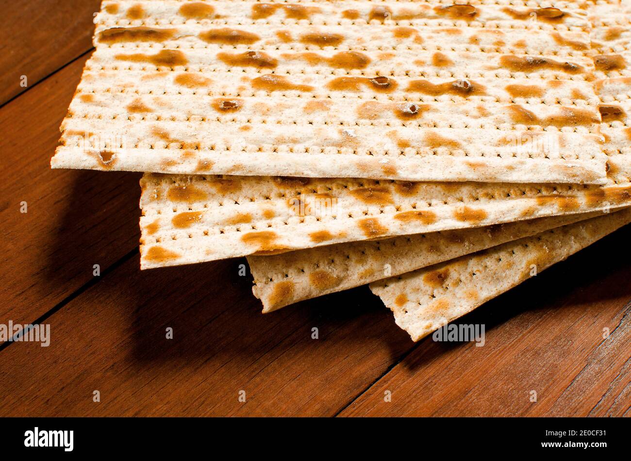 traditional Jewish kosher matzo for Easter pesah on a wooden table. Jewish Easter food. Spring. Stock Photo