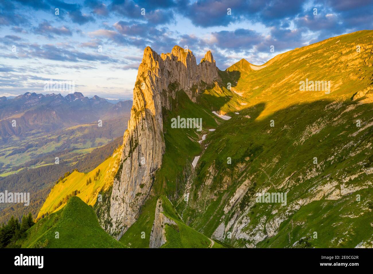 Sunrise on rocky peak of Saxer Lucke mountain in summer, Appenzell Canton, Alpstein Range, Switzerland, Europe Stock Photo