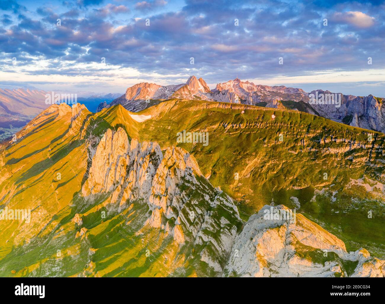 Clouds at dawn over the majestic Santis and Saxer Lucke mountains, aerial view, Appenzell Canton, Alpstein Range, Switzerland, Europe Stock Photo