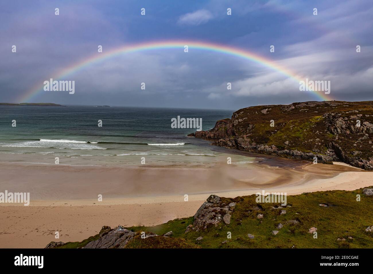 Rainbow over a beach along the N500 (NC500) (North Coast 500), Scotland, United Kingdom, Europe Stock Photo