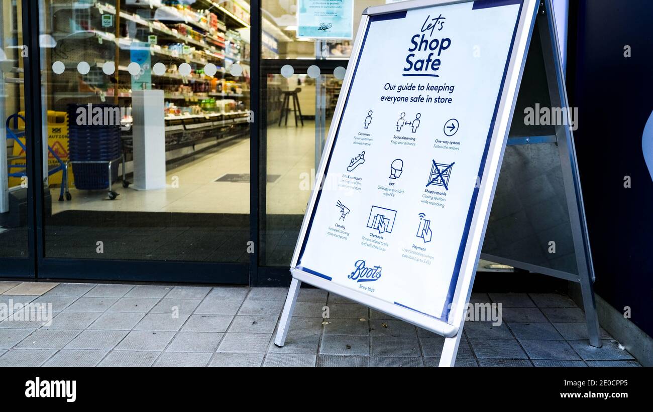 Social distancing signs in the high street hi-res stock photography and ...