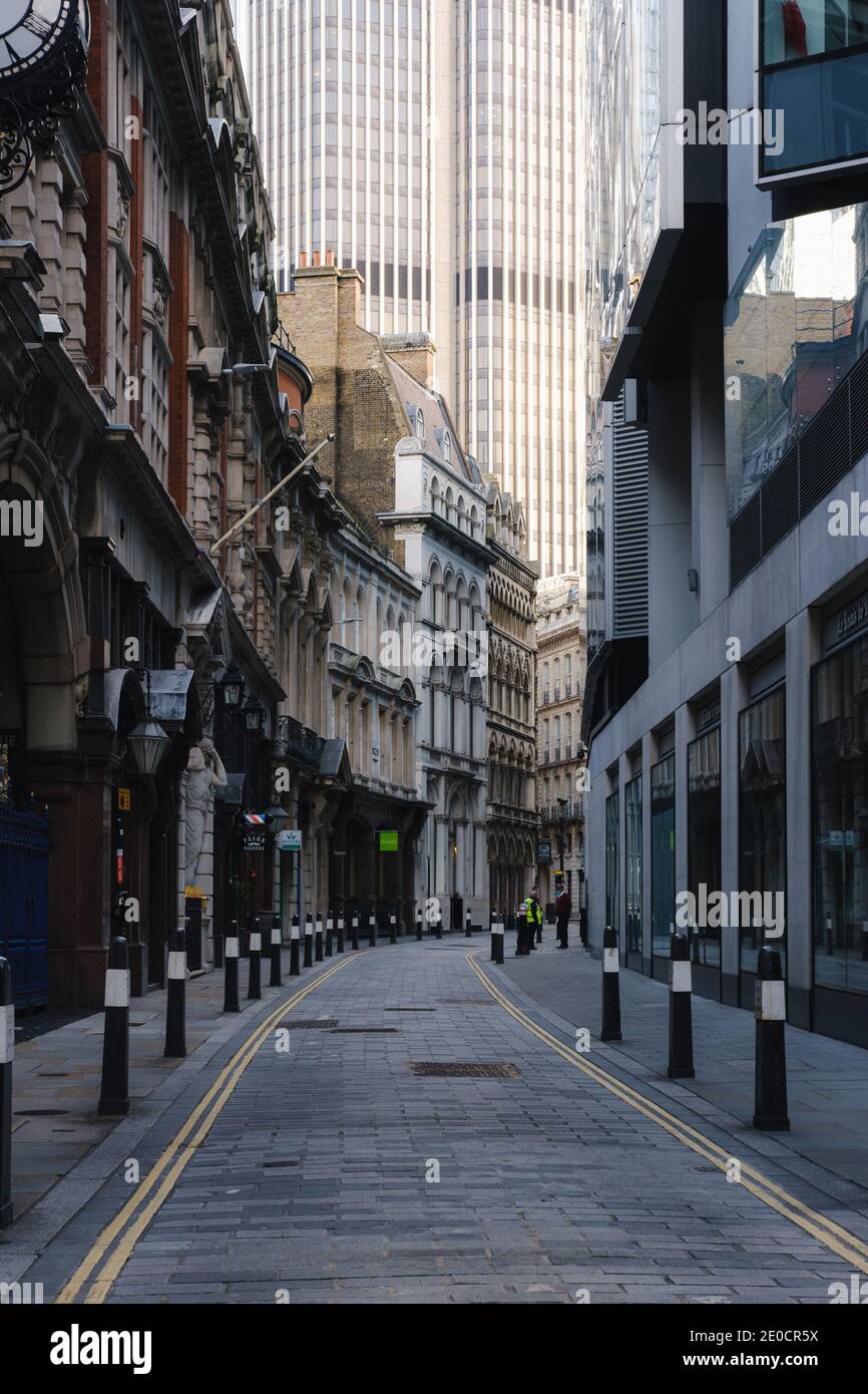 London, UK - December 2020 :   Throgmorton Street in the City of London with quiet streets during Tier 4 lockdown Stock Photo