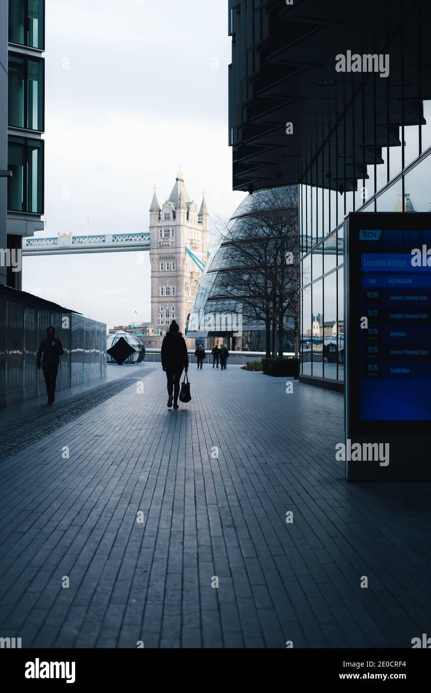 London, UK- December 2020. Modern office buildings of More London and pedestrian walkway looking towards Tower Bridge Stock Photo