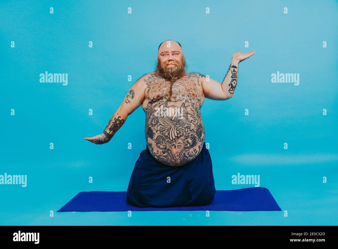 Funny fat man doing yoga meditation, funny and ironic character Stock Photo