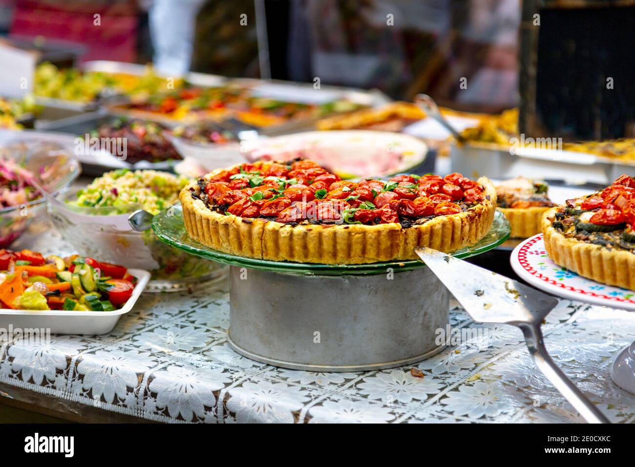 Savoury pies with tomato at Greenwich Market, London, UK Stock Photo